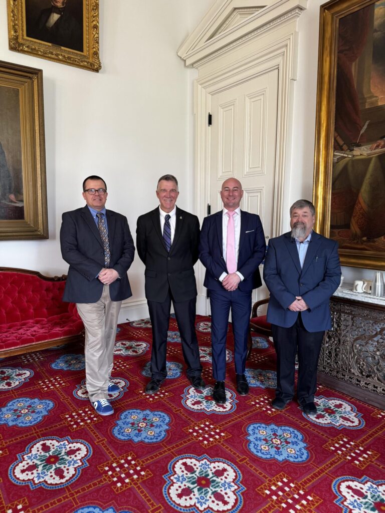 From left: VRLDA Legislative Chair Jeremy Baker of rk MILES, Vermont Gov. Phil  Scott, NRLA Director of Government Affairs Francis Palasieski, and Tim Comes of Goodro Lumber Company Inc. during VRLDA Lobby Day 2025